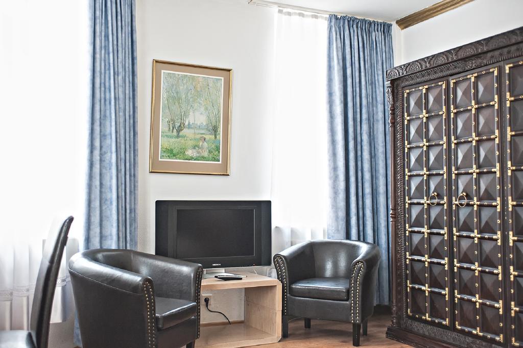 Loewen Hotel Offenbach am Main Szoba fotó